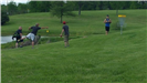 Group of Players Watch Disc Putt at Litz Park