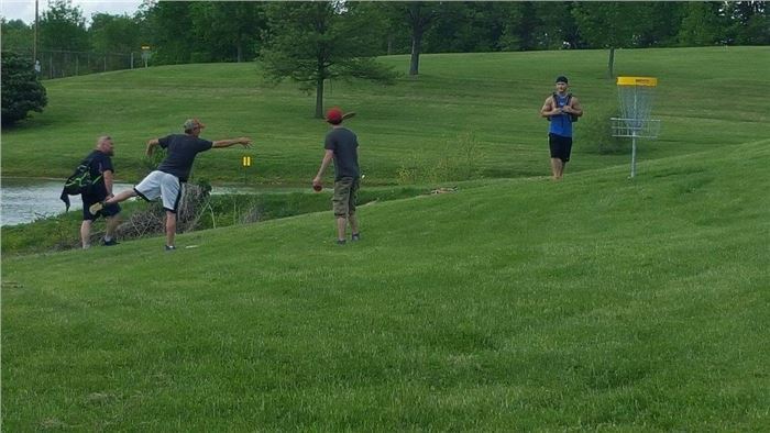 Group of Players Watch Disc Putt at Litz Park
